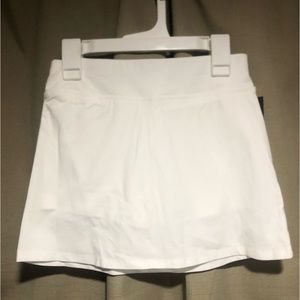 NWT. Skort (skirt w/ attached shorts underneath. Brand:art class size:6-7 & 8